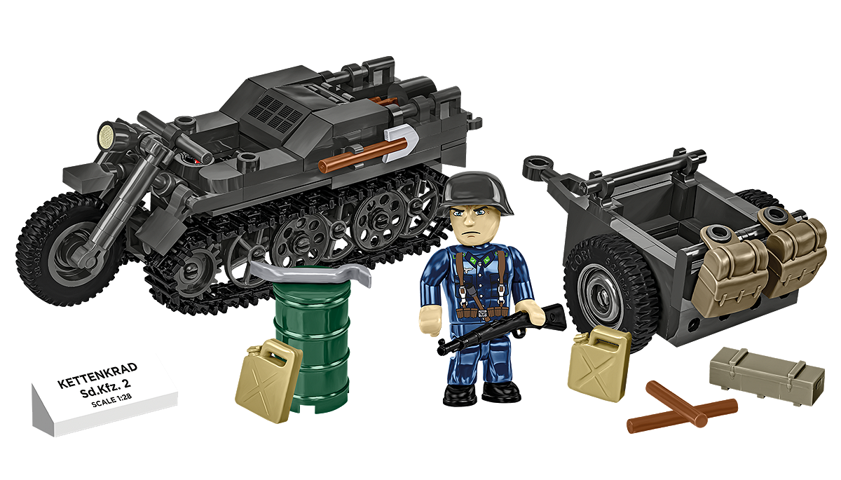 Complete display set featuring the Kettenkrad model, trailer with equipment, minifigure, and information plaque.