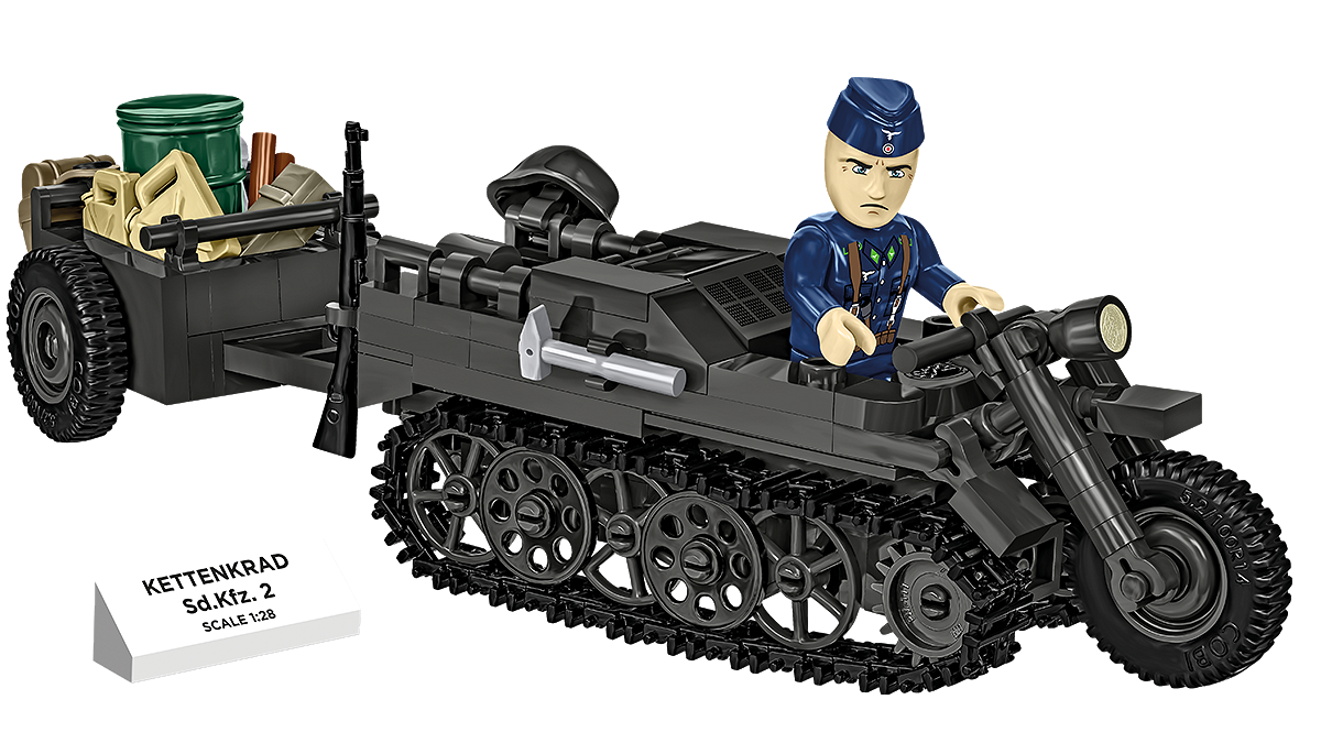 Complete display set featuring the Kettenkrad model with the minifigure mounted on it, trailer with equipment, and information plaque.